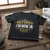 HOLY % @ # $! I'M NOW 18 text design with gears and geometric patterns on a black t-shirt