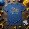 Home Inspector text with house graphics and blueprint elements on a blue t-shirt