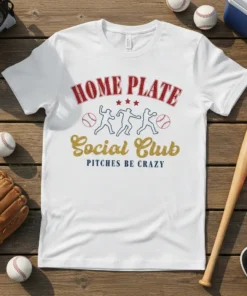White t-shirt with "Home Plate Social Club Pitches Be Crazy" text, baseball player graphics, and baseballs