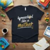 Homeschool like a mother quote on a dark navy t-shirt, with white and gold splattered text and a shield icon