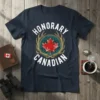 Honorary Canadian t-shirt design with white text, a red maple leaf, and golden antlers