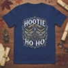 Hootie Ho Ho Christmas T-Shirt featuring two ornate owls and festive text in gold and white