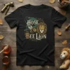 Hose Bee Lion text design with a cartoon bee and a lion illustration on a black t-shirt