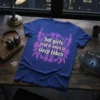 Hot girls read & listen to sleep token text with pink neon wings graphic on blue t-shirt