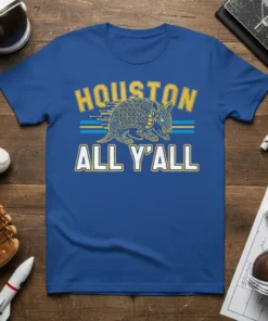 Blue t-shirt with "Houston All Y'all" text and an armadillo graphic, celebrating Houston, Texas pride