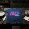 Blue t-shirt with neon pink and cyan text "HOW CAN I HELP YOU?" in a tech-inspired font