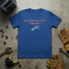 T-shirt with the quote "how hard can it be? boys do it." and a wrench with gear graphic