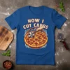 Blue t-shirt with "How I Cut Carbs" text above a cartoon pepperoni pizza being cut with a pizza cutter