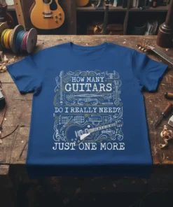 T-shirt with the text "HOW MANY GUITARS DO I REALLY NEED? JUST ONE MORE" surrounded by various guitar illustrations and