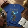 Owl sitting on books with text "How many nights a week should you be reading? 6-7" on a blue t-shirt