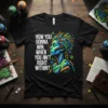 Black t-shirt with white text "HOW YOU GONNA WIN, WHEN YOU AIN'T RIGHT WITHIN?" and a colorful abstract portrait of