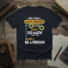 How to Be a Math Person T-Shirt with steps "Do Math" and "Be a Person" and gear graphics