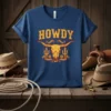 Blue t-shirt with yellow and red "HOWDY" text and a steer skull with cactus graphic