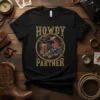 Black t-shirt with "Howdy Partner" text and a cowboy dachshund graphic wearing a hat and bandana