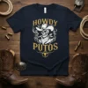 Howdy Putos t-shirt design with a smoking cowboy skull graphic and distressed gold text