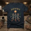 Navy t-shirt with "HOWDY" text, dancing cowboy skeletons, cacti, and a sun graphic in a western desert theme