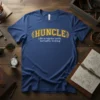 Blue t-shirt with yellow text that reads "Huncle Like a regular uncle, but better looking"