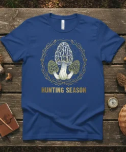 Hunting Season t-shirt featuring a detailed illustration of morel mushrooms surrounded by a golden wreath
