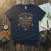 Husband & Wife Geocahing Partners For Life text design with compass and mountains graphic on a navy t-shirt