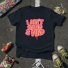 I Ain't Hard 2 Find bold orange and pink graffiti-style text on a black t-shirt