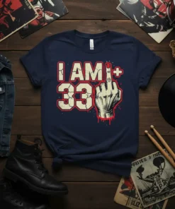 I Am+ 33 graphic tee with a middle finger gesture and distressed numbers, black navy shirt