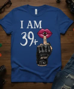 I AM 39+ birthday t-shirt with lips and middle finger graphic. White text and red lips on blue shirt