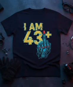 I AM 43+ text with a retro futuristic cyborg middle finger graphic on a black t-shirt