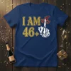 I Am 46+ birthday t-shirt design with gold glitter text and a skeleton hand holding a masquerade mask