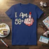 I Am 59+|59+ humorous birthday t-shirt with a middle finger graphic and red nail polish