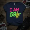 I AM 59+ birthday t-shirt with neon pink and green text and a yellow middle finger graphic