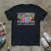 Black t-shirt with white and colorful text reading "I AM CURRENTLY UNSUPERVISED I know, it freaks me out too. But