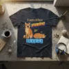 Orange tabby cat graphic with text "I am either yapping or napping" on a dark t-shirt