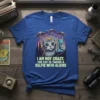 I Am Not Crazy The Cat Is Taking A Selfie With Aliens text on a blue t-shirt with a cat