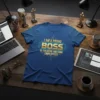 Text "I Am A Proud Boss Of Freaking Awesome Employees" in gold and blue on a royal blue t-shirt with