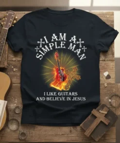 I Am A Simple Man I Like Guitars And Believe In Jesus text with flaming guitar and cross graphic on