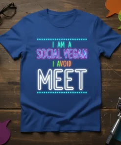 I Am A Social Vegan I Avoid Meet text design in neon style on a blue t-shirt