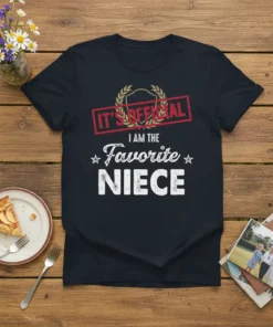 Dark t-shirt with white text that says "IT'S OFFICIAL I AM THE Favorite NIECE" and laurel wreath graphic