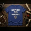 I APPROVE THIS MESSAGE text on a blue t-shirt with a gold seal graphic