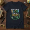 I Became A TEACHER For The MONEY & FAME quote on a navy blue t-shirt, featuring distressed typography and a