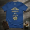 Blue t-shirt with gold text "I BELONG TO JESUS" and gold wings with cross graphic above, and a gold lily