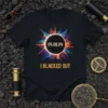 Black t-shirt with colorful solar eclipse graphic and text "I BLACKED OUT 04.08.24" for the total solar eclipse event