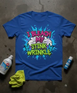 I Bleach My Stink Wrinkle quote on a royal blue t-shirt with vibrant splash graphics and blue butterflies