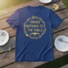 I Bring Nothing To The Table quote on a navy t-shirt, surrounded by cutlery and gears graphic