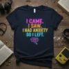 Navy blue t-shirt with neon pink, orange, yellow, and blue text: "I CAME. I SAW. I HAD ANXIETY SO I