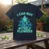 Black t-shirt with "I Can Buy Myself Flowers" text and a detailed cannabis plant graphic in teal and blue
