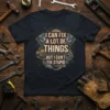I Can Fix A Lot Of Things But I Can't Fix Stupid quote on a dark t-shirt with piston and