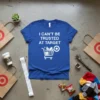 Blue t-shirt with white text "I Can't Be Trusted At Target" and a shopping cart graphic