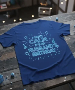 I Can't Calm It's My Husband's Birthday text design with balloons and party hats on a navy t-shirt
