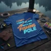 I CAN'T I HAVE PLANS WITH MY FISHING POLE text with neon fishing rod graphic on a blue t-shirt