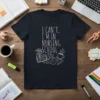 T-shirt with the white text "I CAN'T, I'M IN NURSING SCHOOL" and medical-themed doodles for nursing students